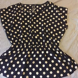 Cute navy and white peplum top!